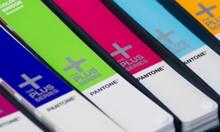 Design Pantone color swatch booklets in various colors.