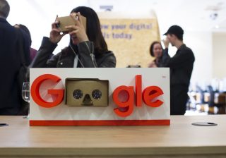 Google logo with a virtual reality set in place of the two O's in Google.