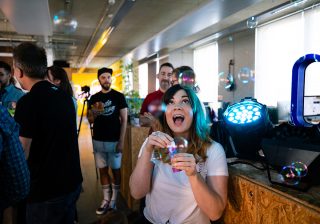 Juila blowing bubbles