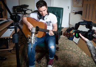 james from sweet wave audio playing guitar