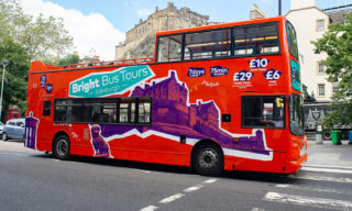 Photo of orange Bright Bus Tours Bus