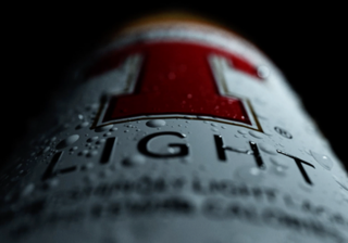 Closeup of a 3D render of Tennent’s Light Bottle