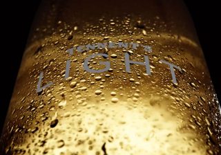 Closeup of a 3D render of Tennent’s Light Bottle