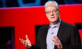 TED Talk: Sir Ken Robinson Sir Ken Robinson delivering a TED talk on a stage