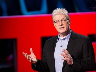TED Talk: Sir Ken Robinson Sir Ken Robinson delivering a TED talk on a stage
