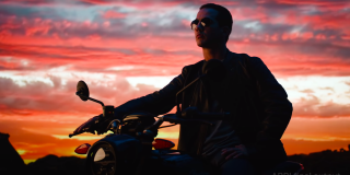 Virtual Production Demo with UE4’s Next-Gen VP Tools Man sitting on a motorcycle with sunset in the background