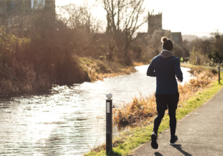 Cleanslate Photography Photo of man running next to a canal