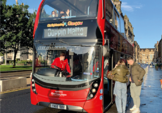 Photo showing Doppio Malto Bus at George Square in Glasgow