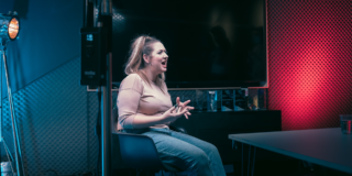 Behind the Scenes - Babs Talking Head woman talking to a camera