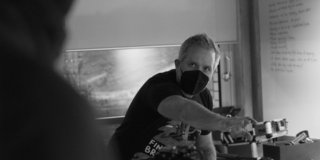 Behind the Scenes - Directing! a man directs the crew on how to film a shot