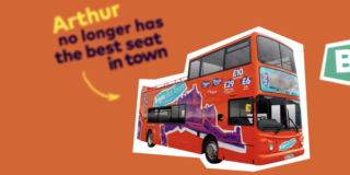 Still frame of Bright Bus Brand Launch Film showing bus on orange background and copy 