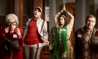 four characters from a film acting silly while standing