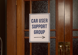 support group sign on a door that says 'car user support group'