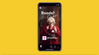 Phone showing instagram stories for the campaign on a yellow background