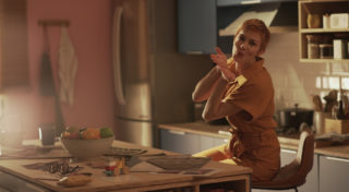 behind the scenes - woman blowing a kiss