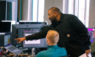 Naresh Art Directing Naresh working on a project with our creative team