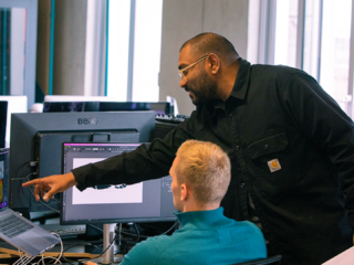 Naresh working on a project with our creative team