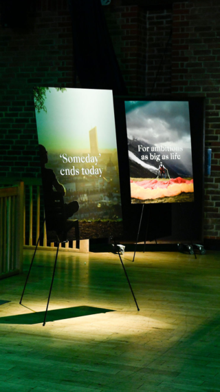photo of two posters on display easels