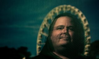 Google Engineer Blake Lemoine a photo of Google Engineer Blake Lemoine with a dark blue background