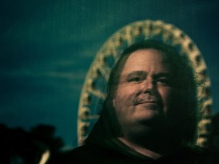 a photo of Google Engineer Blake Lemoine with a dark blue background