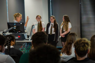 a photo of Gemma, Jane and Melissa Presenting their Idea at d&ad new gen awards