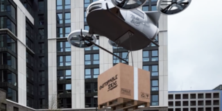 MadeBrave x The Social Hub - Special Delivery still frame from a video showing an air taxi dropping off a box in front of the social hub glasgow