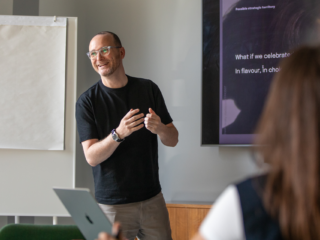 a photo of mark cullen giving a presentation