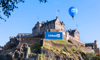 LINKEDINburgh Castle - Opening Soon! photo of edinburgh castle covered in linkedin branding