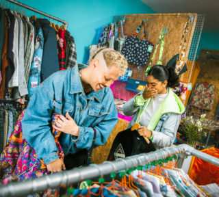 Fist Bus LFG Campaign - Looking For Gems photo of a man and woman shopping for clothes and smiling