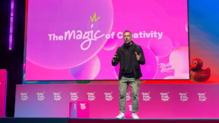 Andrew Dobbie at Baltic Brand Forum photo of andrew dobbie, CEO / founder of madebrave standing on a stage with