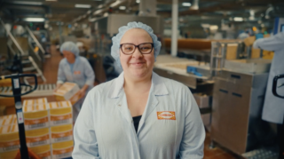photo of a smiling Tunnock's employee