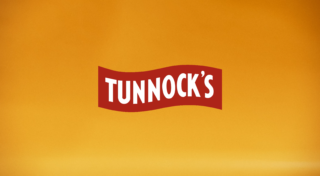 Tunnock's Brand Film - Tunnock's Logo image of the tunnock's logo over a yellow gradient background