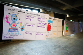 Kids Make Glasgow - Illustrations photo of several kids illustrations up on a clothesline