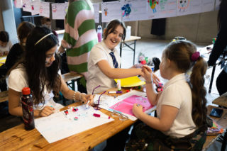 Kids Make Glasgow photo of a little girl smiling with her friends