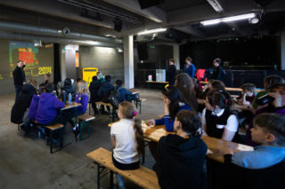 Kids Make Glasgow a photo of andrew dobbie presenting to a bunch of kids